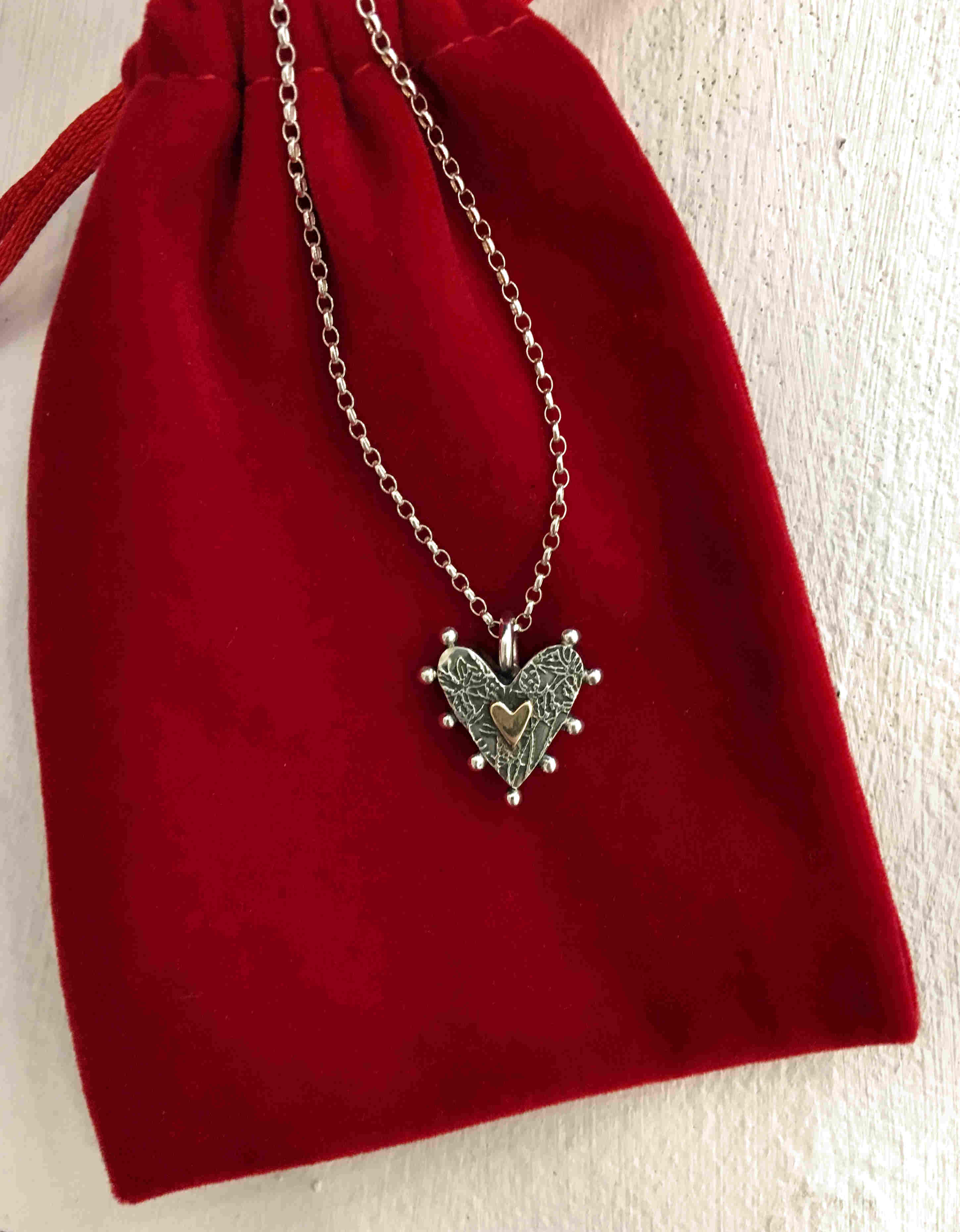 'Box Heart Necklace with Centred 9ct Gold Heart and Etched Thistles' by artist Carol Docherty